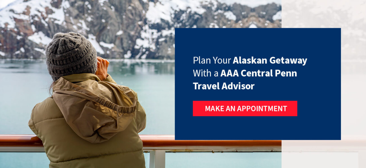 Woman looking out as Alaskan landscape