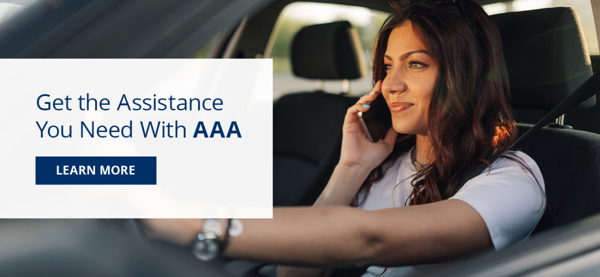 a woman talking on the phone in her car