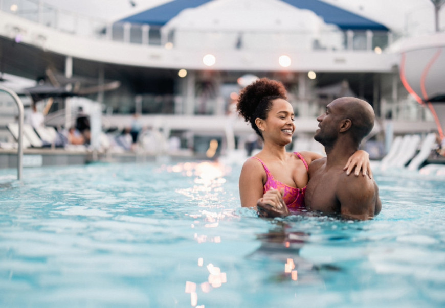 couple swimming in pool