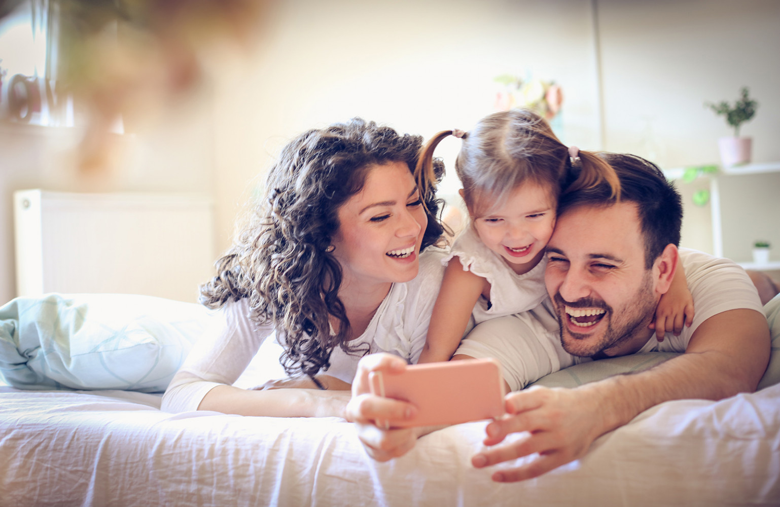 Family playing with a phone