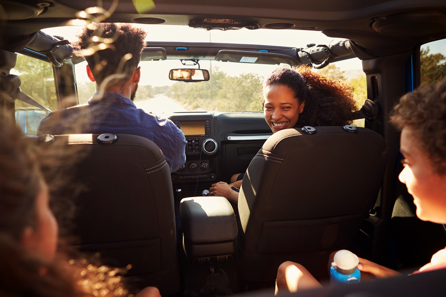 Excited family on a road trip