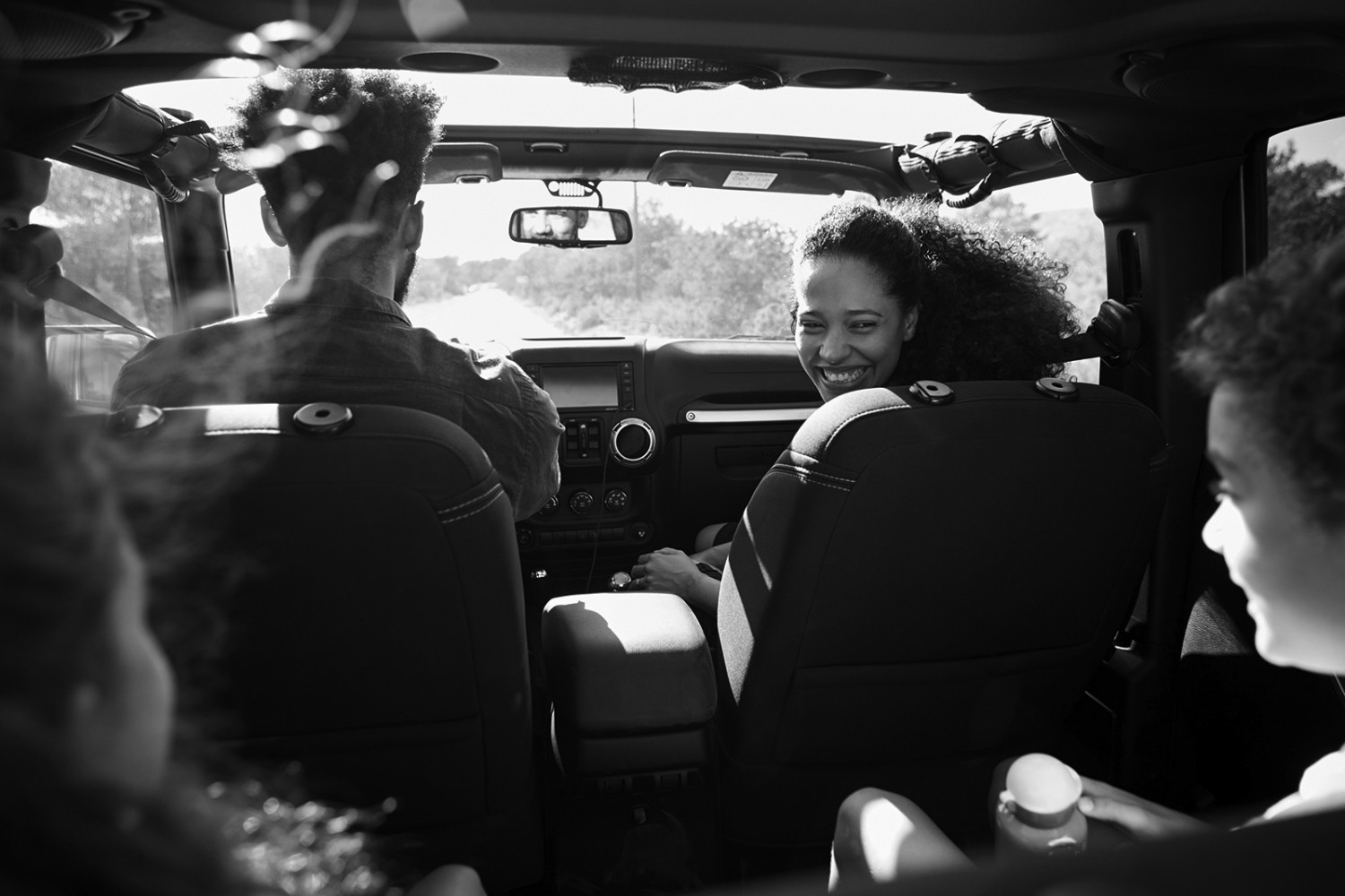 Family car ride grey scale