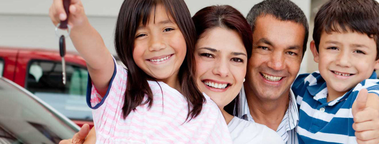 Family photo holding up car keys