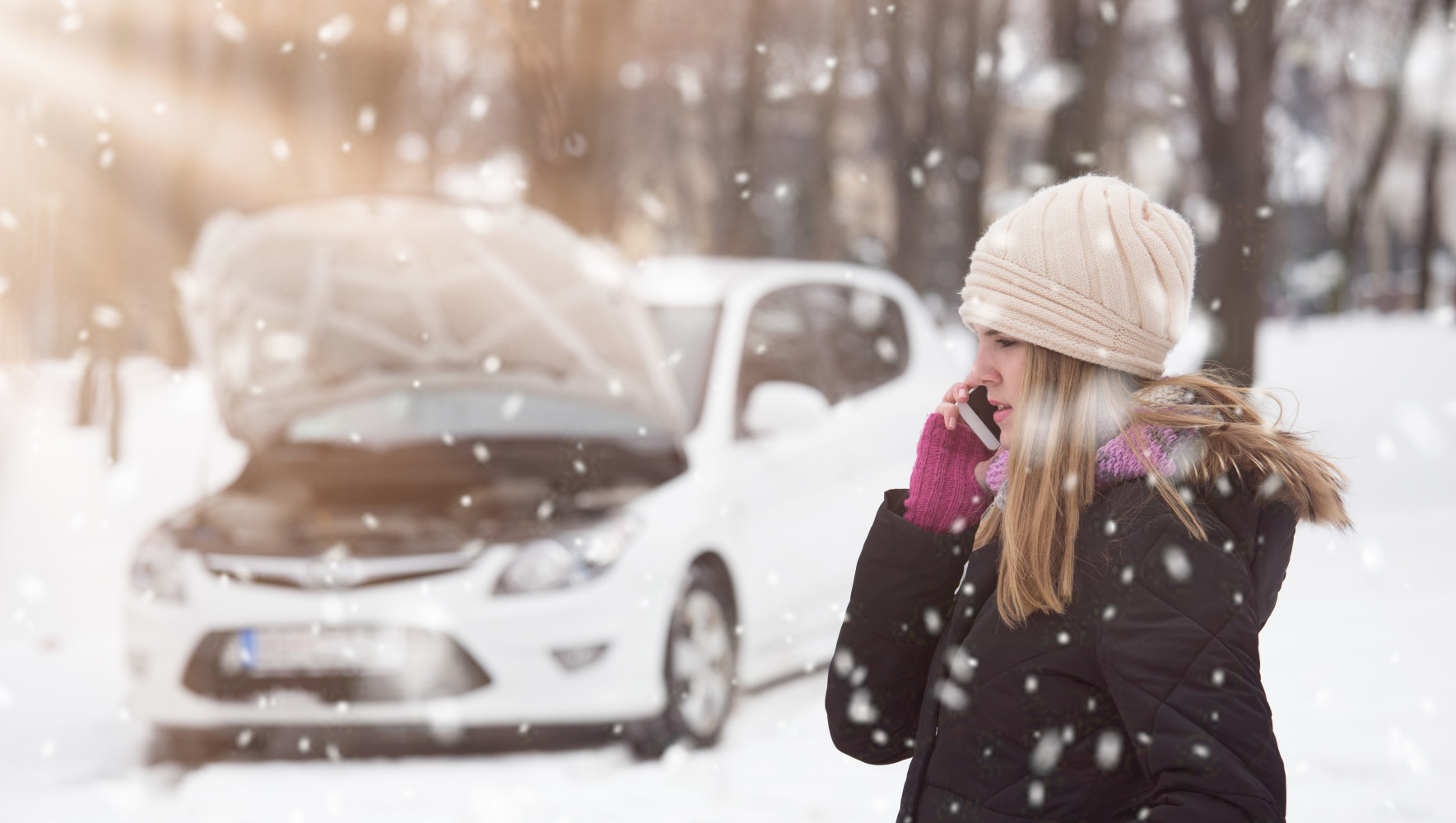 Roadside Assistance - Winter Girl Talking on Phone