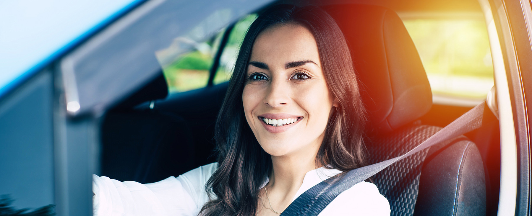 Driving Women Smiling White Shirt