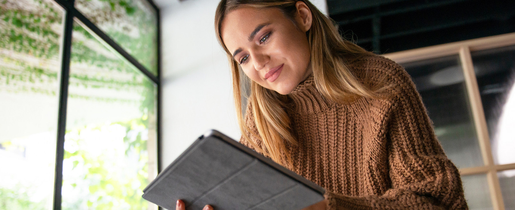 Girl on ipad sitting