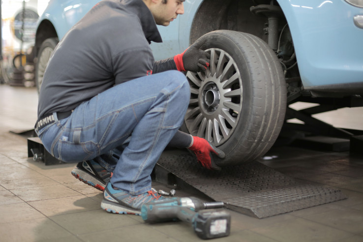 Man Changing Tire 