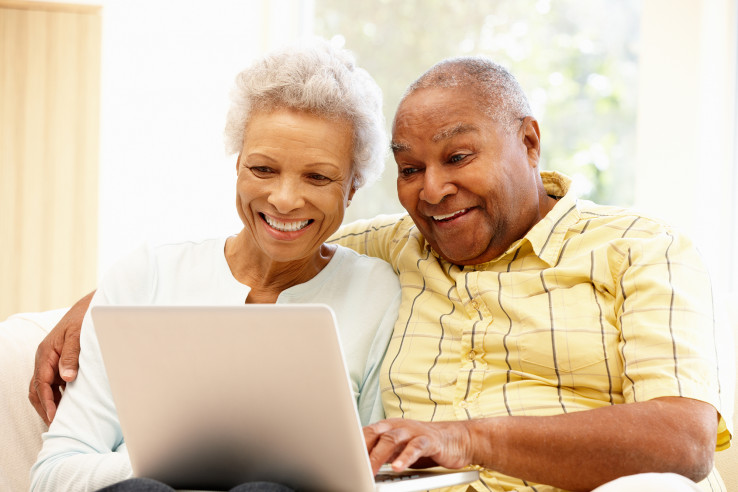Mature Operator - Couple on Laptop