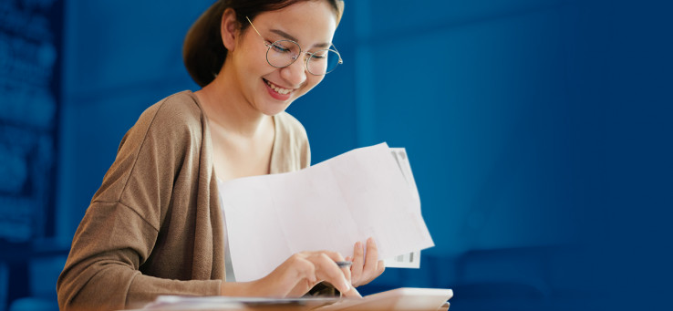 Woman using a calculator