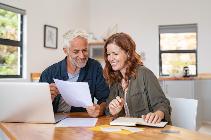 Senior Couple Reviewing Paperwork