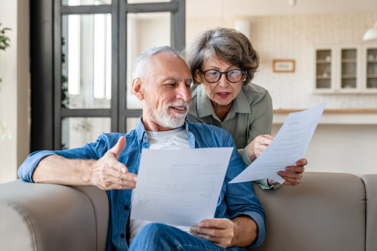 Senior Couple Reviewing Paperwork