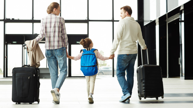 Travel Insurance Family Walking Airport