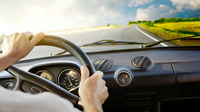 Car Hands on Wheel