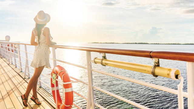 Cruise - Woman on deck sun
