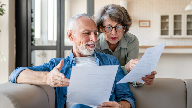 Senior Couple Reviewing Paperwork