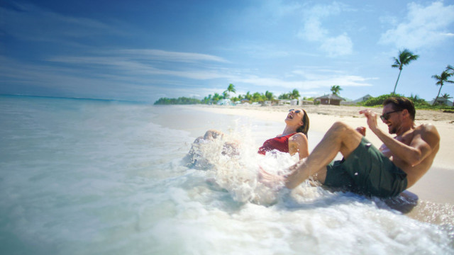 Celebrity - Couple Beach Laughing