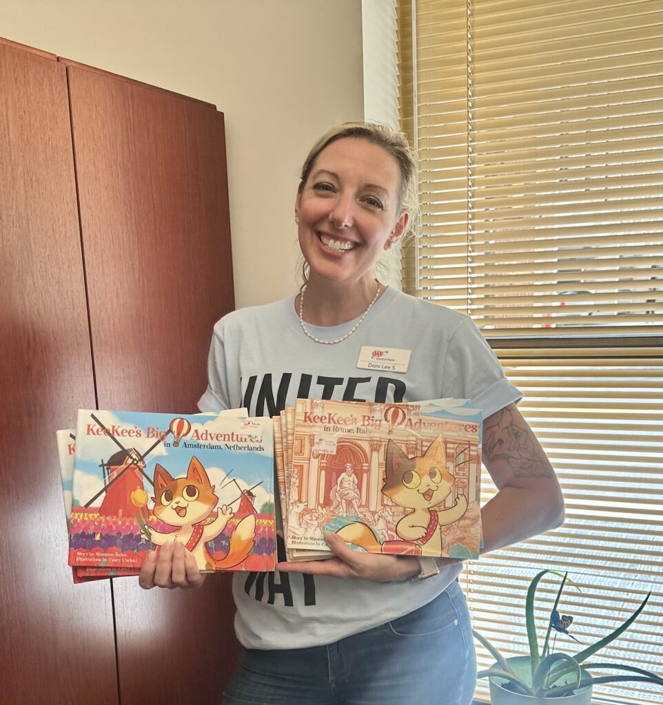 HAR_Doni with 8 Books for all Dauphin County Libraries 2