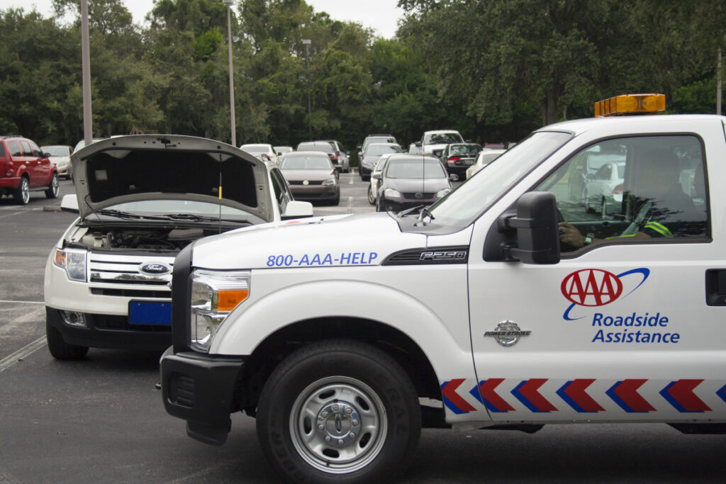 AAA road side assistance truck helping customer