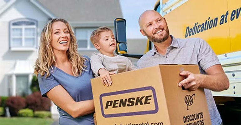 family moving with a Penske moving truck