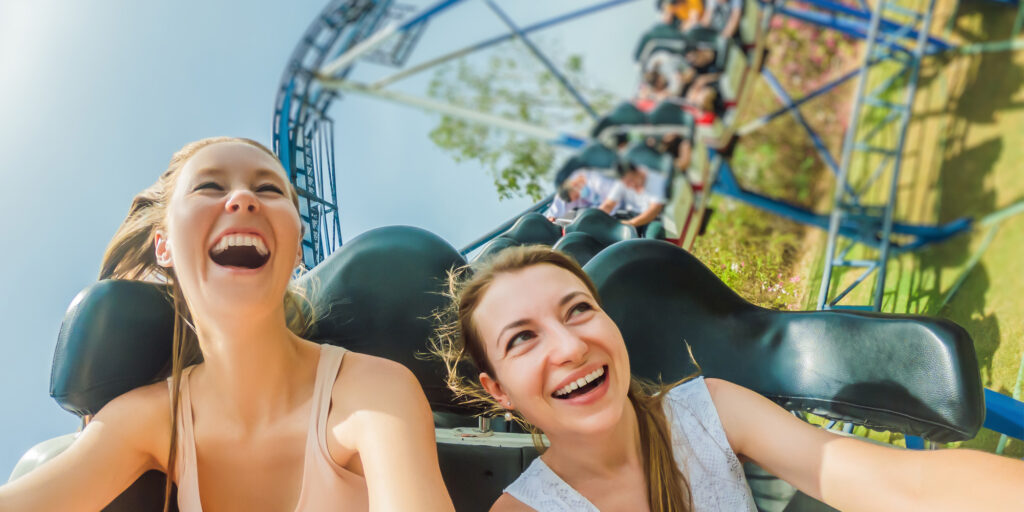 two women on rollercoaster