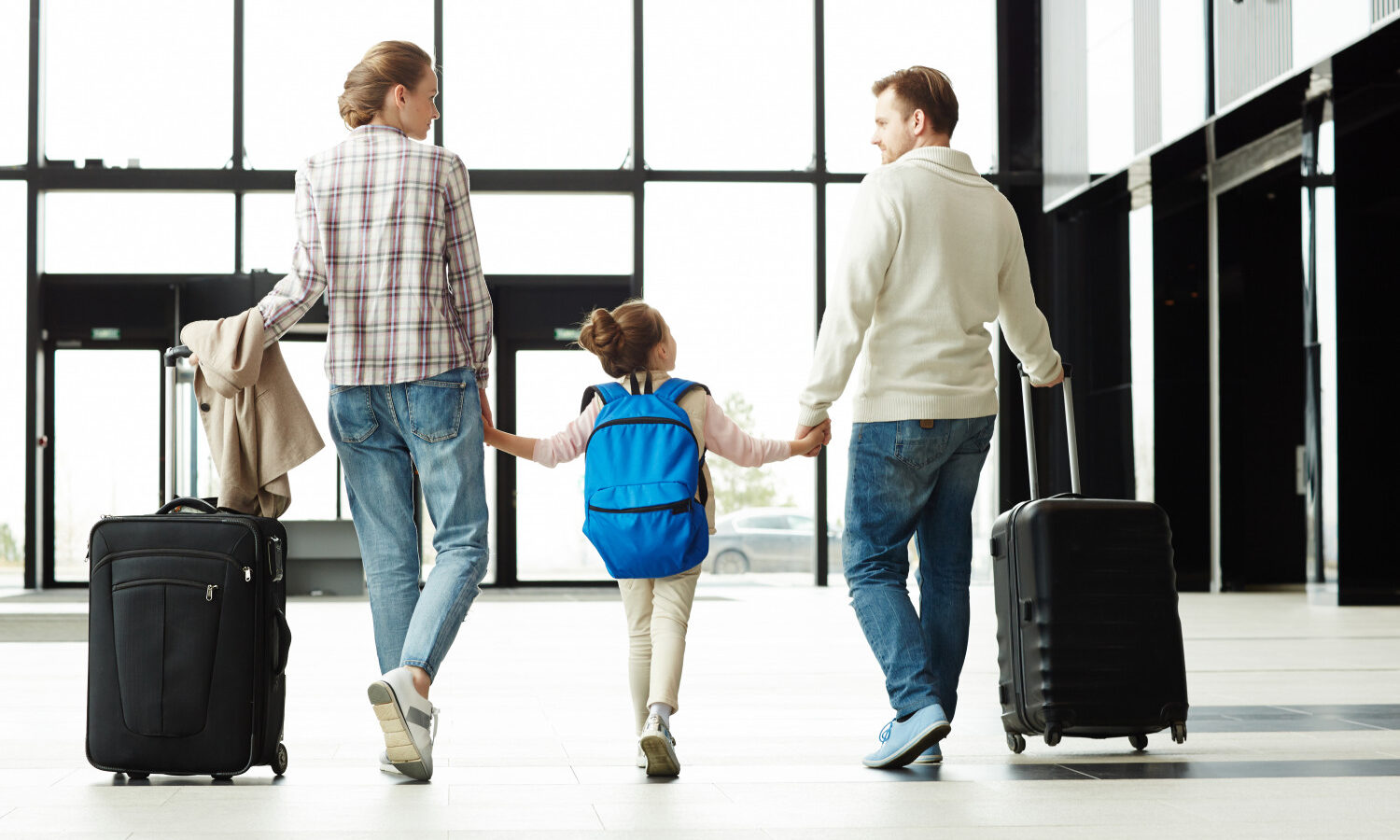 family walking in airport